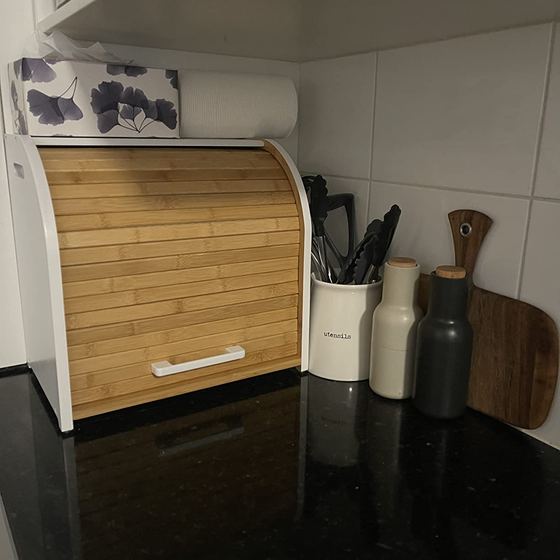 Eva's bread box on a dark bench