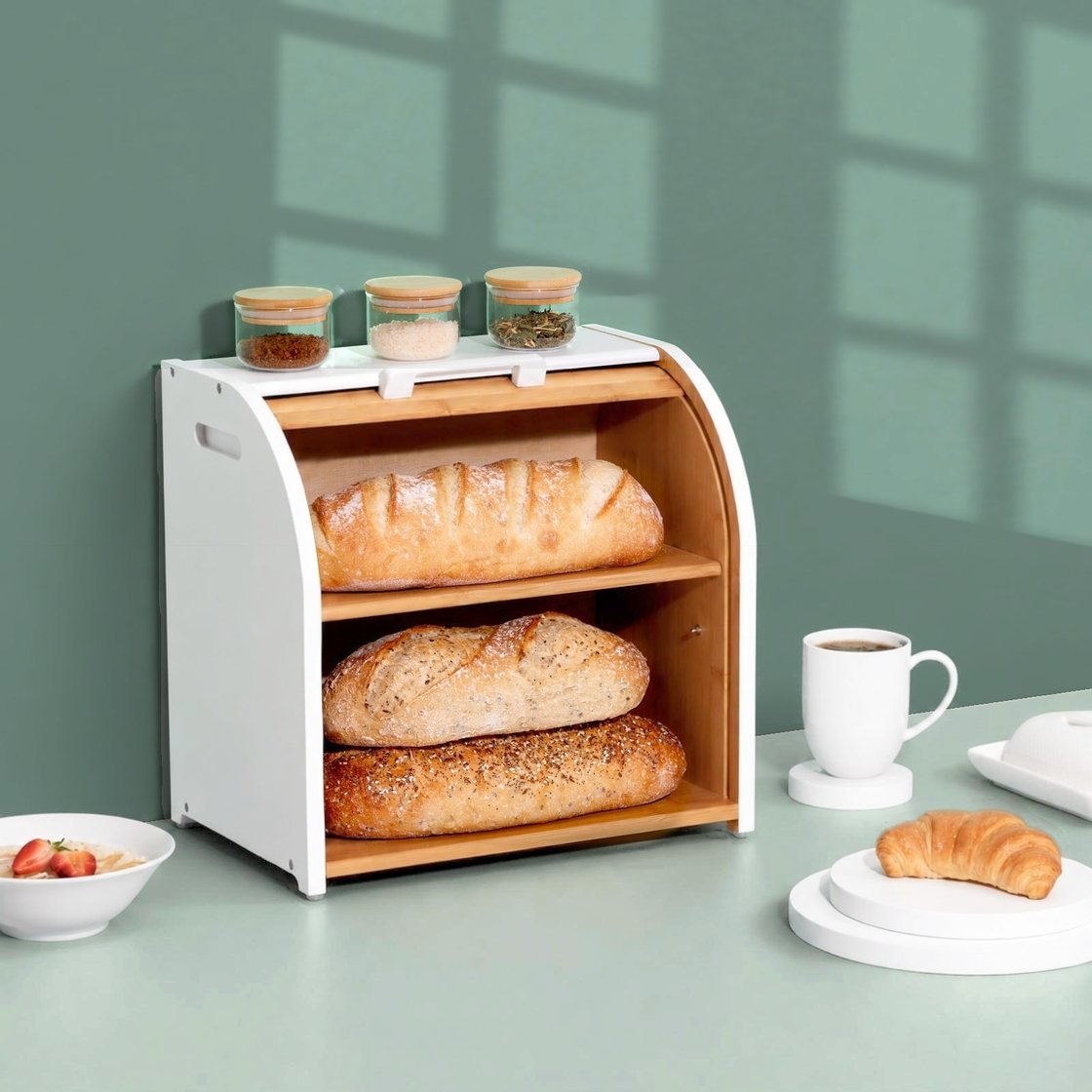 White bread box open, with loaves on both shelves